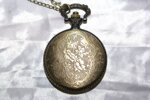 antico-orologio-da-tasca-con-gufo-quartz