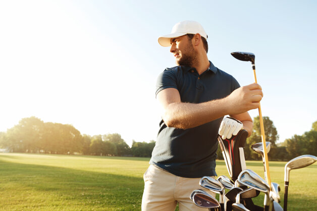 man-golfer-taking-out-golf-club-from-bag.jpeg man-golfer-taking-out-golf-club-from-bag.jpeg
