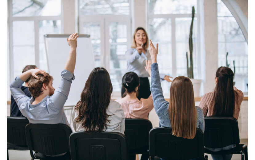 female-speaker-giving-presentation-hall-university-workshop-audience-conference-hall.jpeg female-speaker-giving-presentation-hall-university-workshop-audience-conference-hall.jpeg