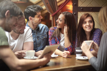 group-friends-enjoying-coffee-shop.jpeg