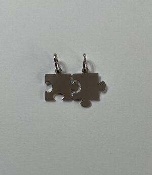 ciondolo-in-argento-puzzle