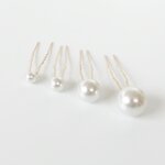 7555-conf-con-15-pz-spillone-oro-con-scala-perle-4-mis-mixed