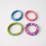 10145-set-con-4-pz-elastico-fermacoda-fiori-glitter