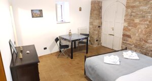 camera-letto-appartamenti-myassisisuite-centro