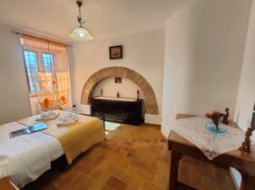 Camera da letto matrimoniale a piano terra di All'Ombra di Santa Chiara a Assisi centro