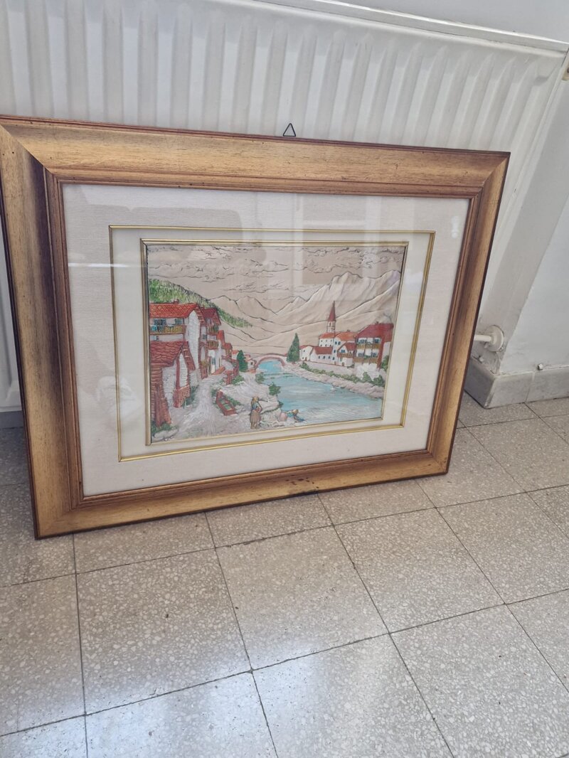 bassorilievo-paesaggio-con-tetti-rossi