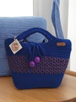 borsa-artigianale-in-fettuccia-elastica-con-perle-viola